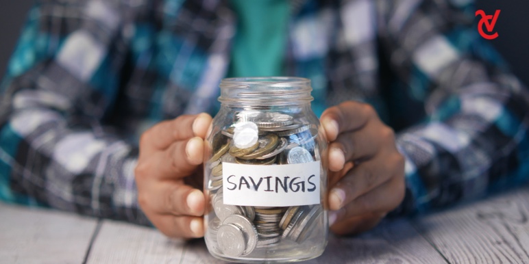 A savings jar filled with coins.