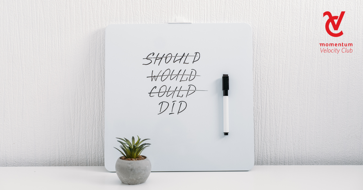 A board with the words should, could, would and DID written on it. Declare your intentions to the universe and build a reminder of the financial goals you're working towards.