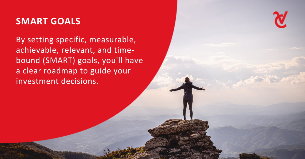 A woman standing in a mountainous area with her arms stretched out while contemplating her investment goals.