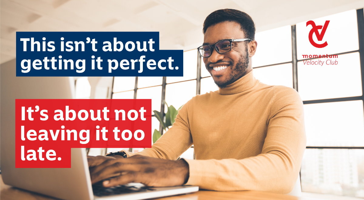 A professional graphic for Momentum Velocity Club featuring a man at a computer. The image conveys that the value of a financial adviser lies in encouraging clients to take action now to avoid the stress of leaving financial tasks too late.